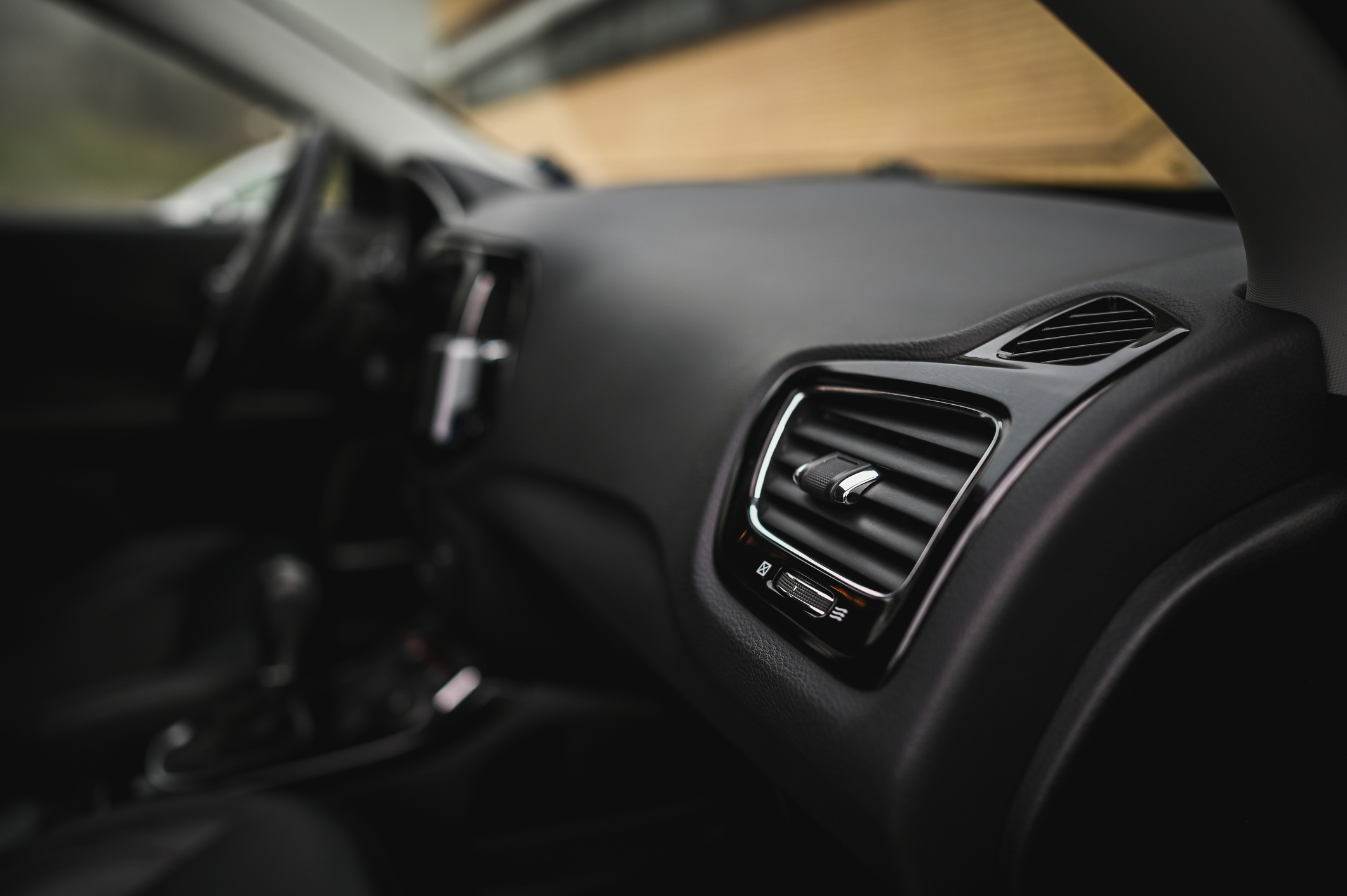 Close-up of car air conditioning ventilation system inside modern vehicle